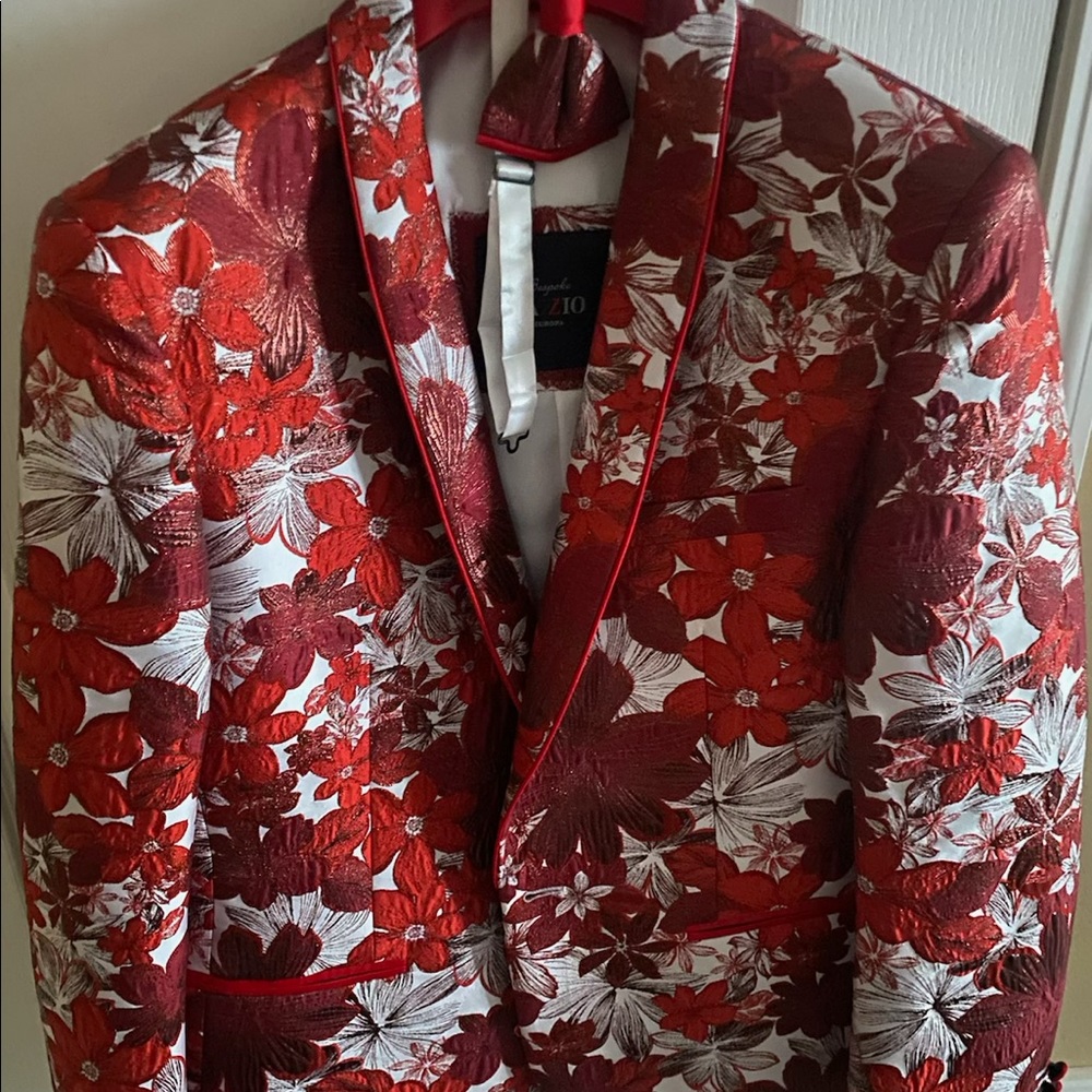 Red and white fitted jacket and matching bow tie.